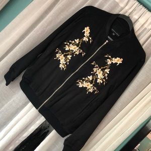 Black white and gold silky jacket